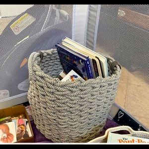Woven rope basket in neutral grey for chic decor and storage!